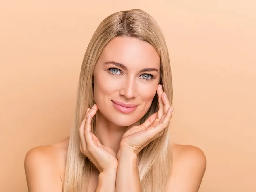 Mature woman with firm, beautiful skin after boosting collagen with Morpheus8 treatment.