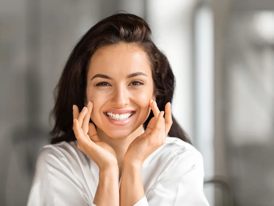 Beautiful woman with radiant skin after IPL treatment