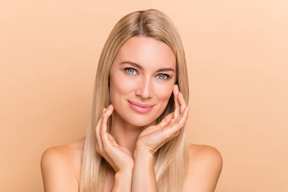 Mature woman with firm, beautiful skin after boosting collagen with Morpheus8 treatment.